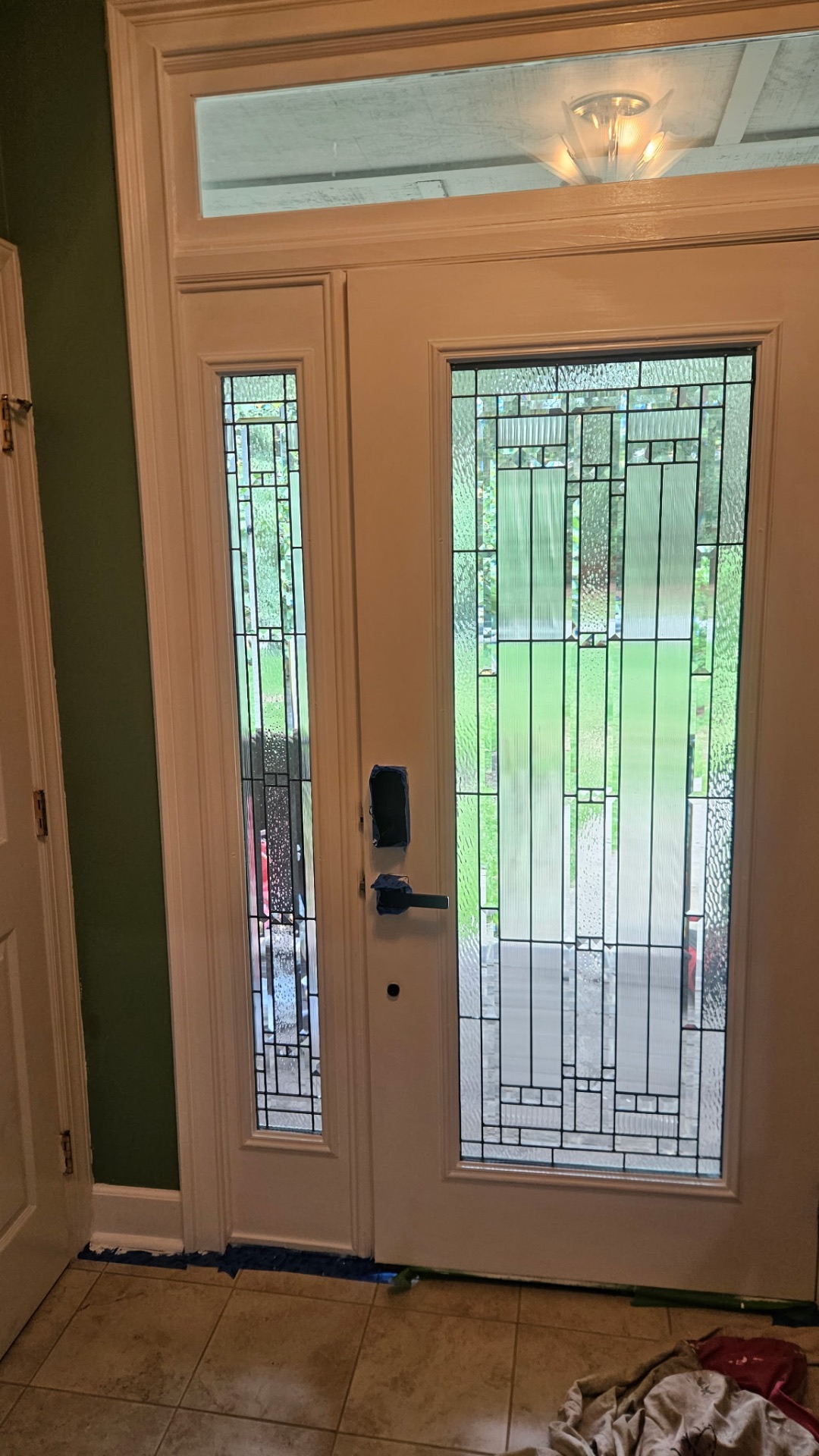 New door set in the opening with hardware fitted and taped off