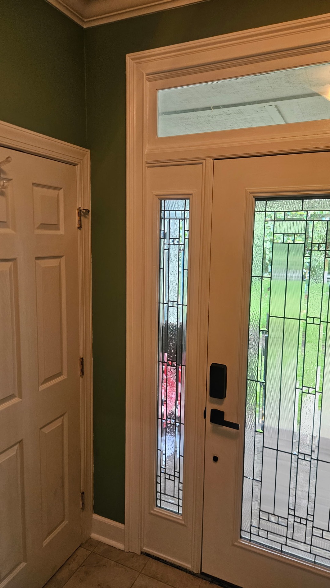 Interior view of the finished entry, jamb, casing, and threshold